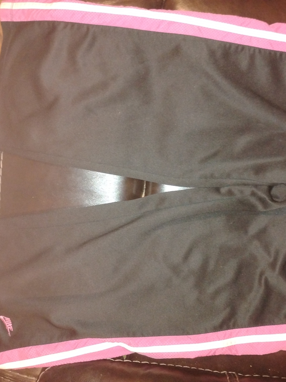 Nike Black Sweatpants with Black Logo Tag and Pink Nail Accent